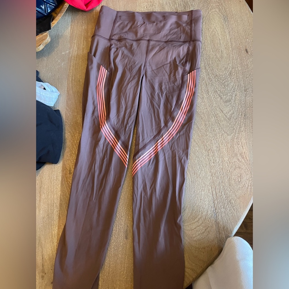 never worn lululemon pants, made for high impact and adjustable waistband